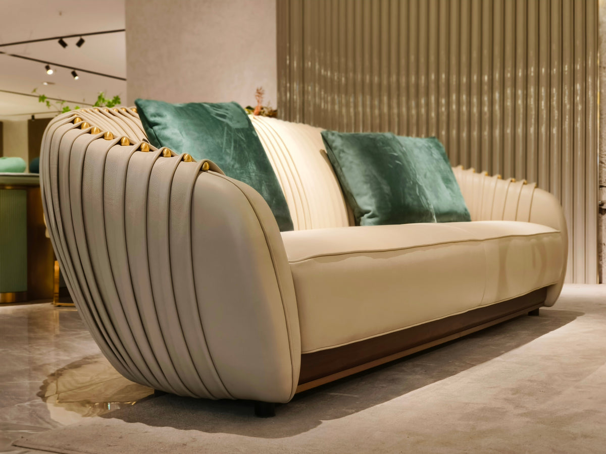 Luxury Beige Leather Sofa with Decorative Accent Pillows