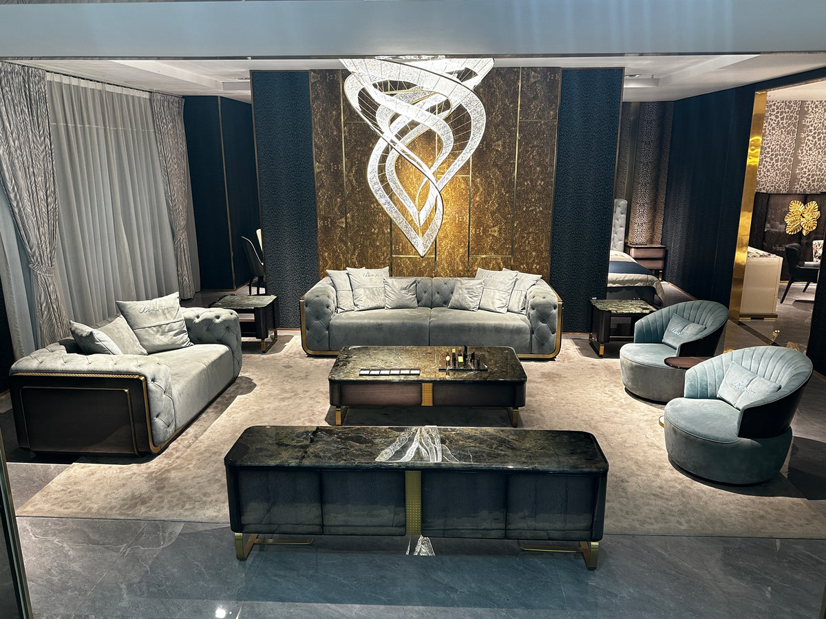 Luxury Cream Leather Sofa with Gold Accents and Decorative Pillows