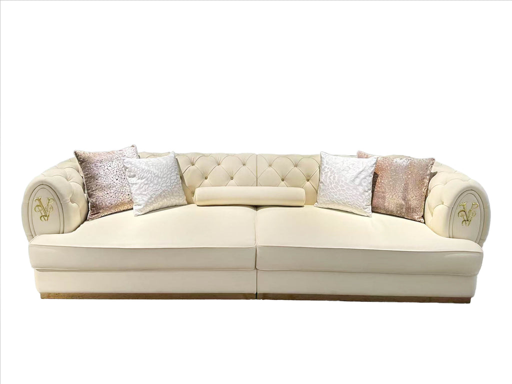 Luxury Cream Tufted Sofa with Decorative Accents