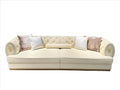 Luxury Cream Tufted Sofa with Decorative Accents