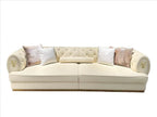 Luxury Cream Tufted Sofa with Decorative Accents