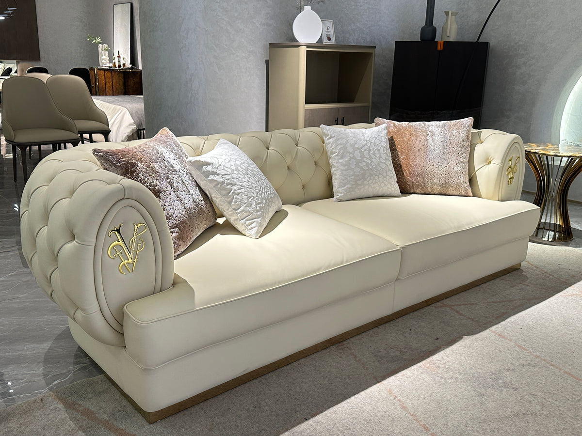 Luxury Cream Tufted Sofa with Decorative Accents