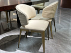 Elegant Beige Leather Chair with Metallic Frame