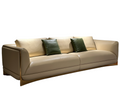 Luxury Beige Leather Sofa with Green Accent Pillows
