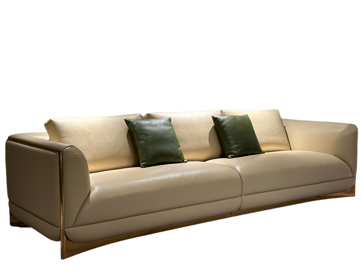 Luxury Beige Leather Sofa with Green Accent Pillows
