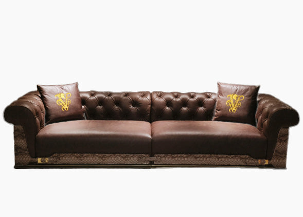 Luxury Tufted Sofa with Embroidered Pillows and Patterned Accents