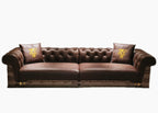 Luxury Tufted Sofa with Embroidered Pillows and Patterned Accents