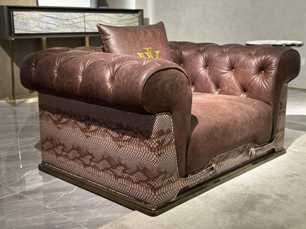 Luxury Tufted Sofa with Embroidered Pillows and Patterned Accents