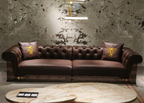 Luxury Tufted Sofa with Embroidered Pillows and Patterned Accents