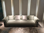 Luxury Tufted Sofa with Embroidered Pillows and Patterned Accents