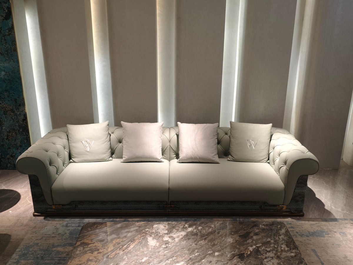 Luxury Tufted Sofa with Embroidered Pillows and Patterned Accents