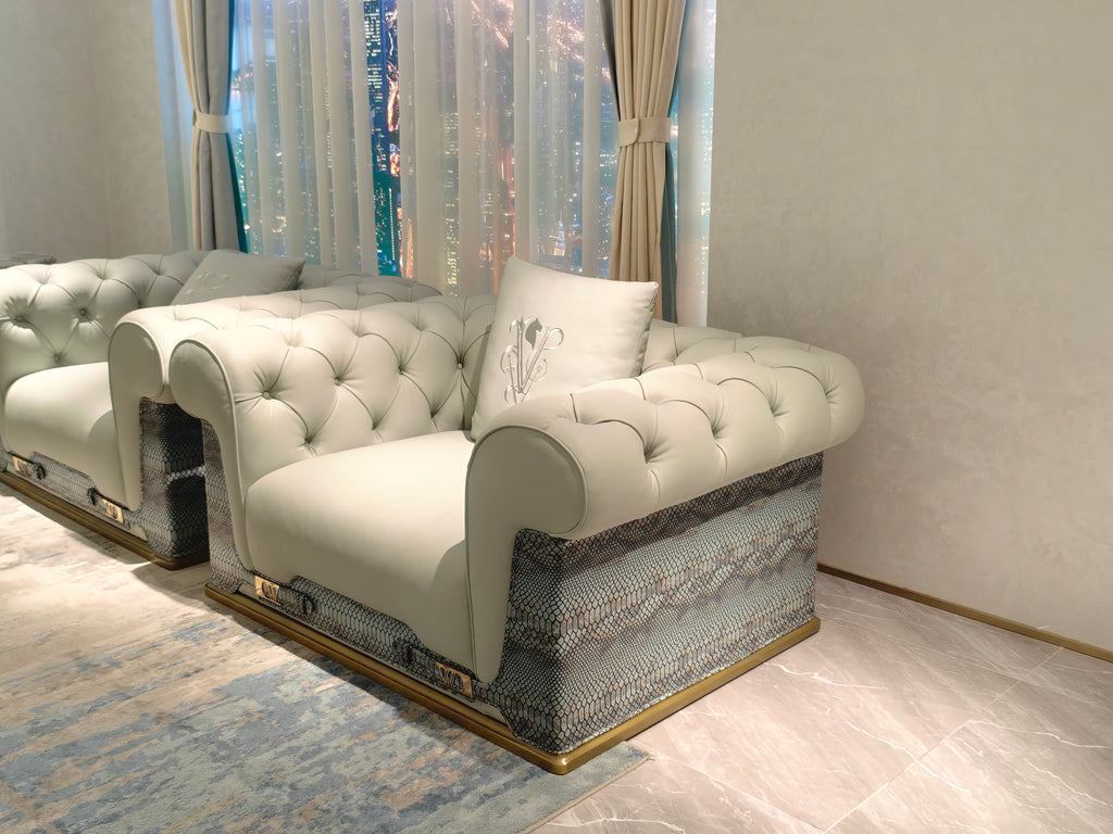 Luxury Tufted Sofa with Embroidered Pillows and Patterned Accents
