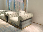 Luxury Tufted Sofa with Embroidered Pillows and Patterned Accents