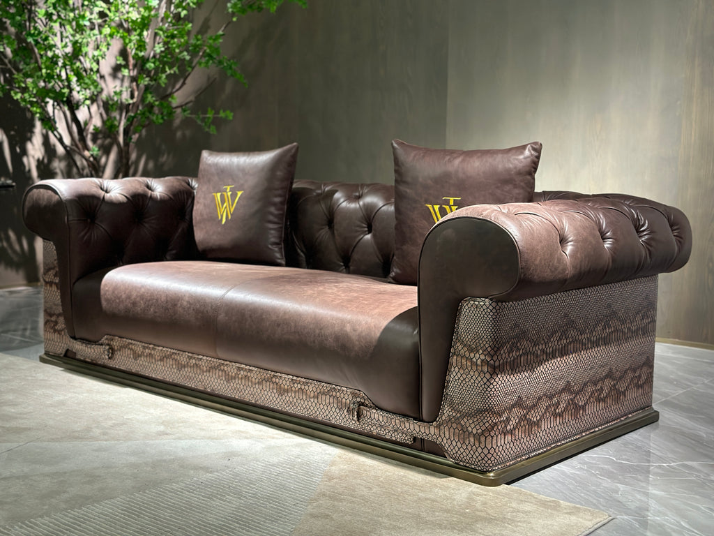 Luxury Tufted Sofa with Embroidered Pillows and Patterned Accents