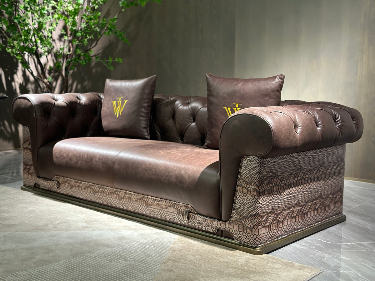 Luxury Tufted Sofa with Embroidered Pillows and Patterned Accents