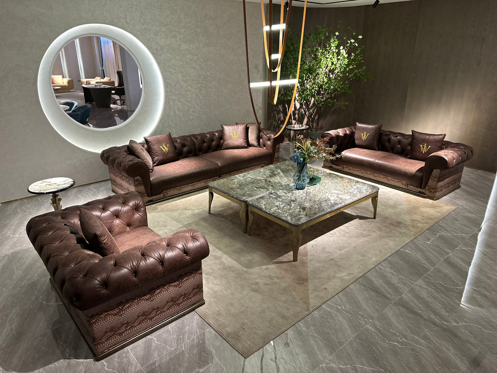 Luxury Tufted Sofa with Embroidered Pillows and Patterned Accents