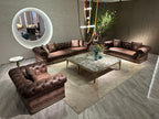 Luxury Tufted Sofa with Embroidered Pillows and Patterned Accents