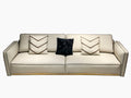 Luxury Cream Leather Sofa with Decorative Pillows and Gold Accents